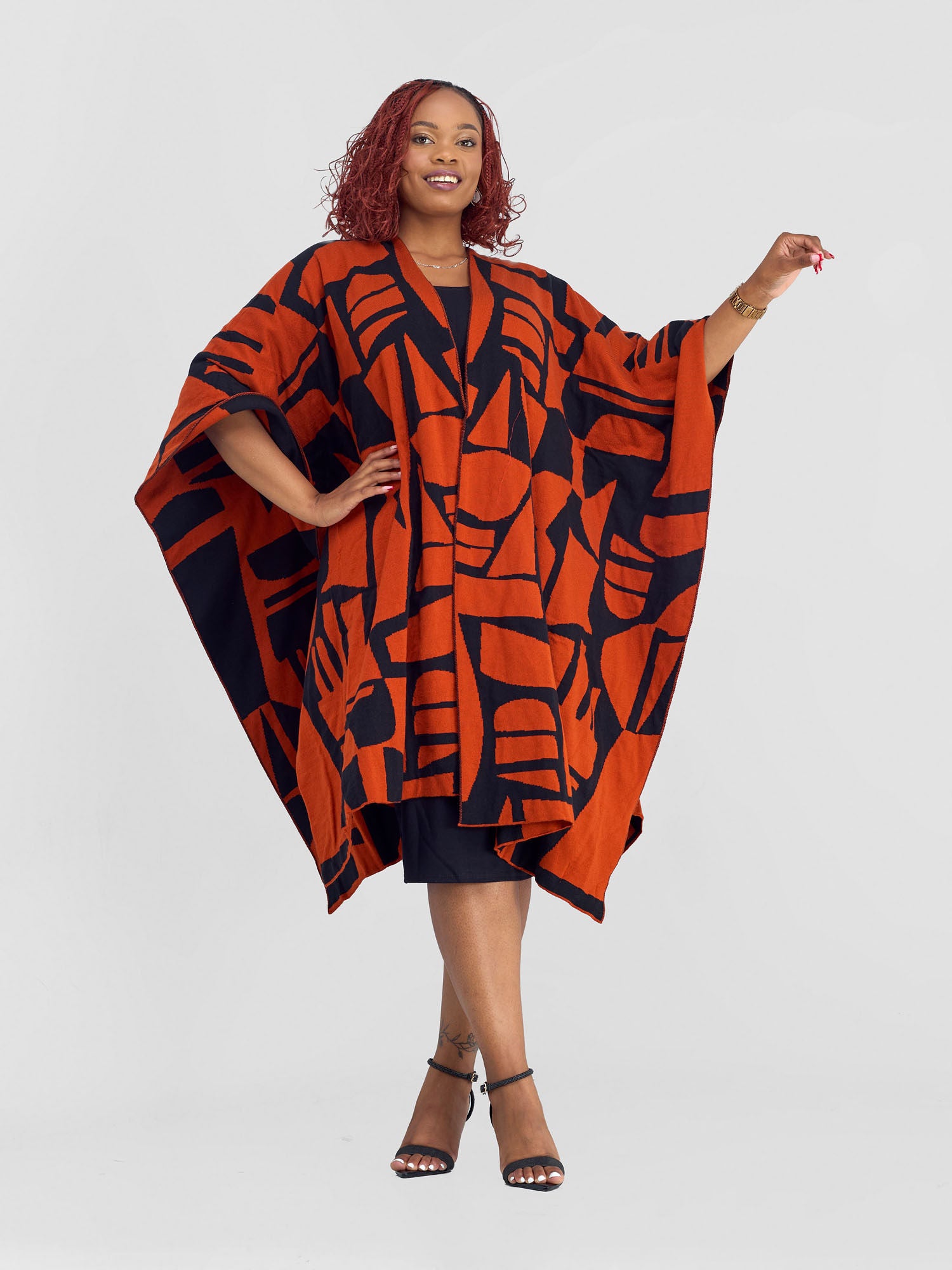 Vivo Reversible Poncho without Fringes - Burnt Orange / Black Samba Print