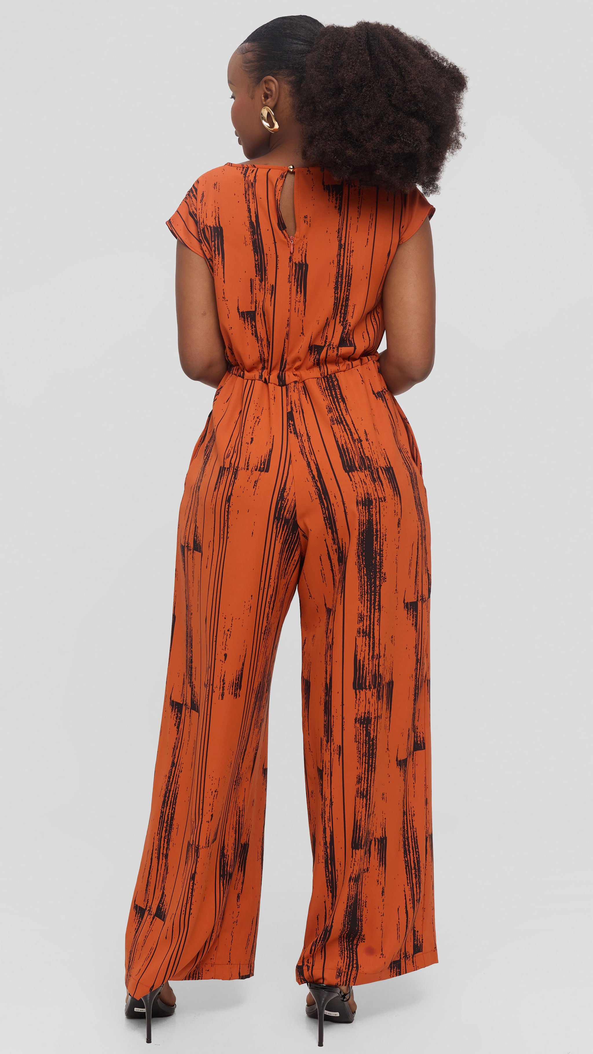 Vivo Sakari Drop Shoulder Jumpsuit in Crepe - Orange / Black Siolo Print