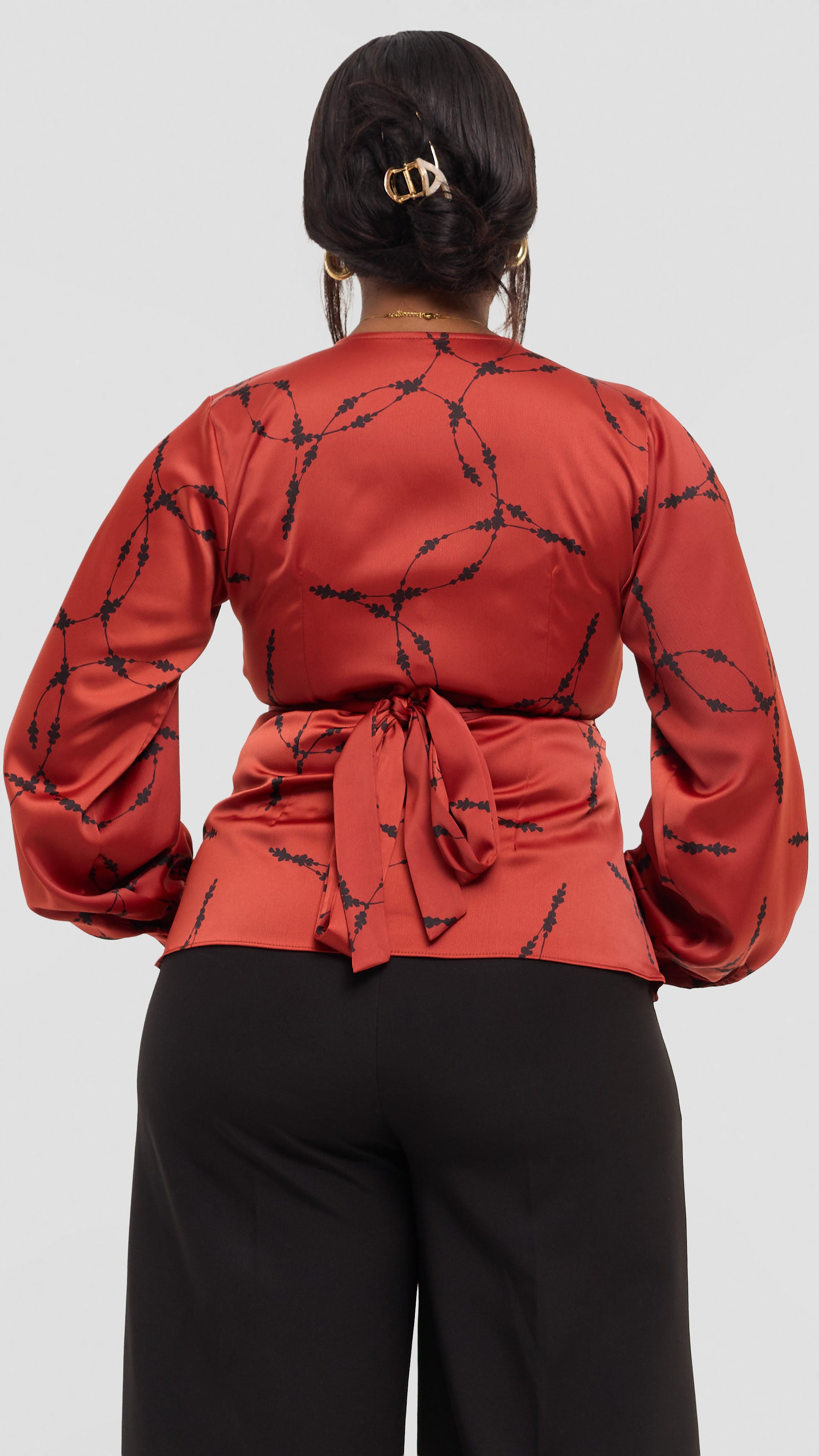 Vivo Merika Wrap Top in Satin - Rust / Black Shina Print