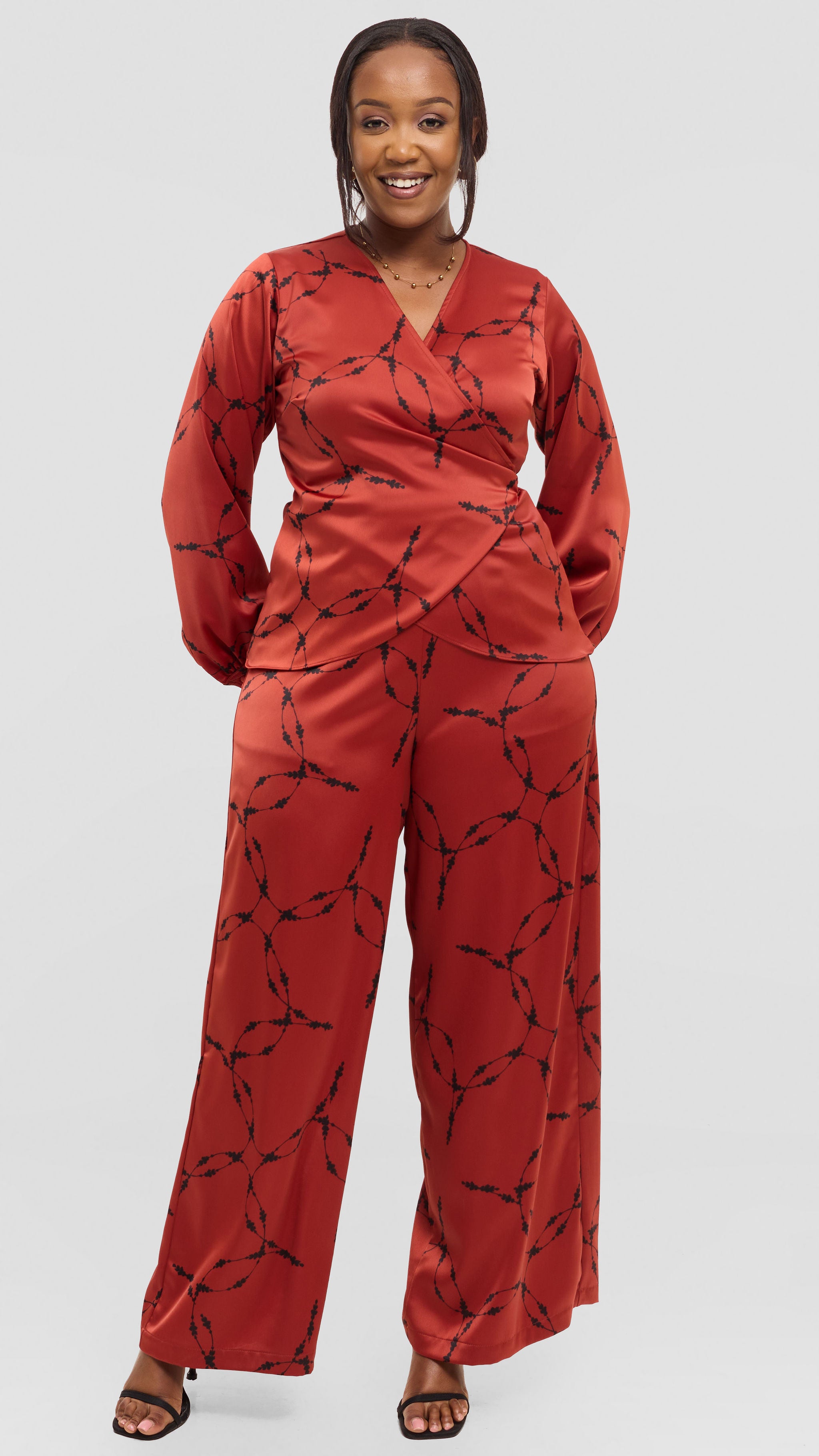 Vivo Merika Wrap Top in Satin - Rust / Black Shina Print