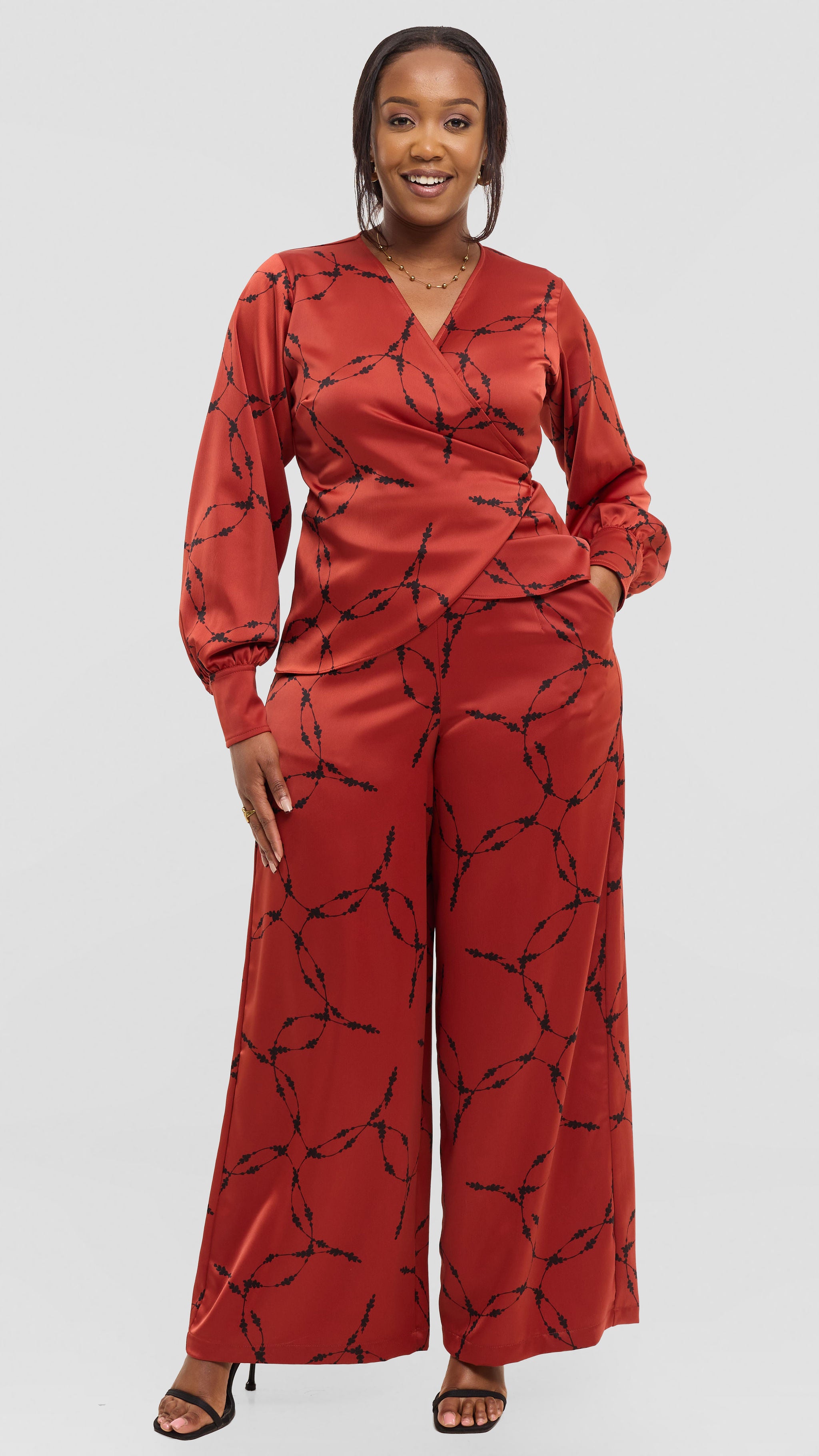 Vivo Essi Wide Leg Pants in Satin - Rust / Black Shina Print