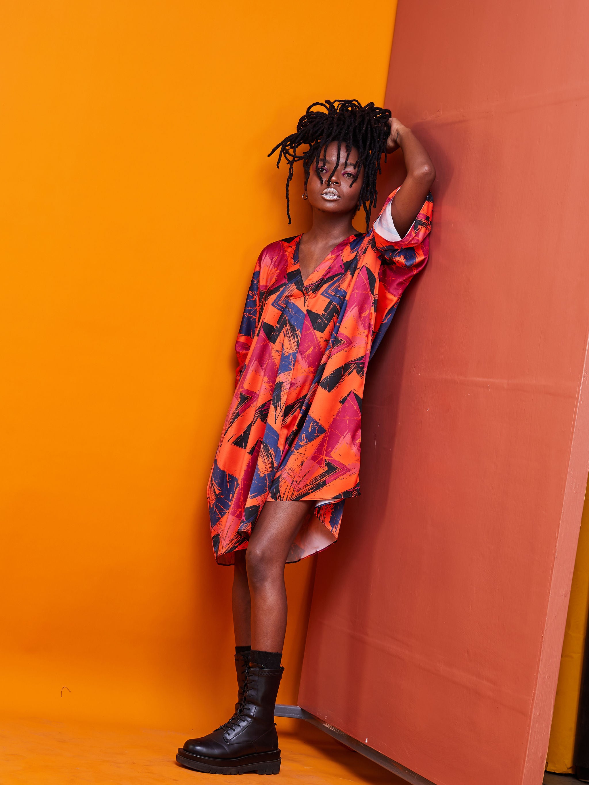 Zoya Brave Satin Loose V-neck Top - Orange Abstract Print