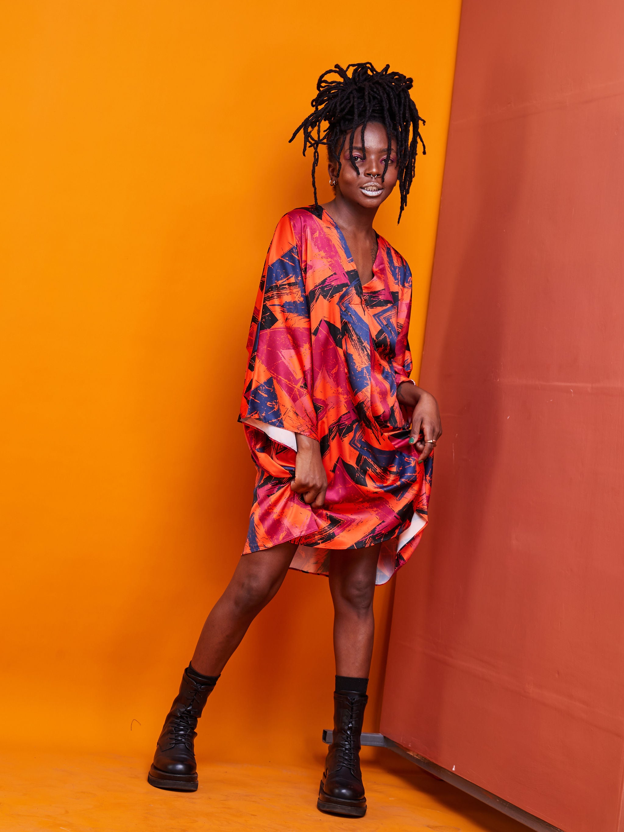 Zoya Brave Satin Loose V-neck Top - Orange Abstract Print