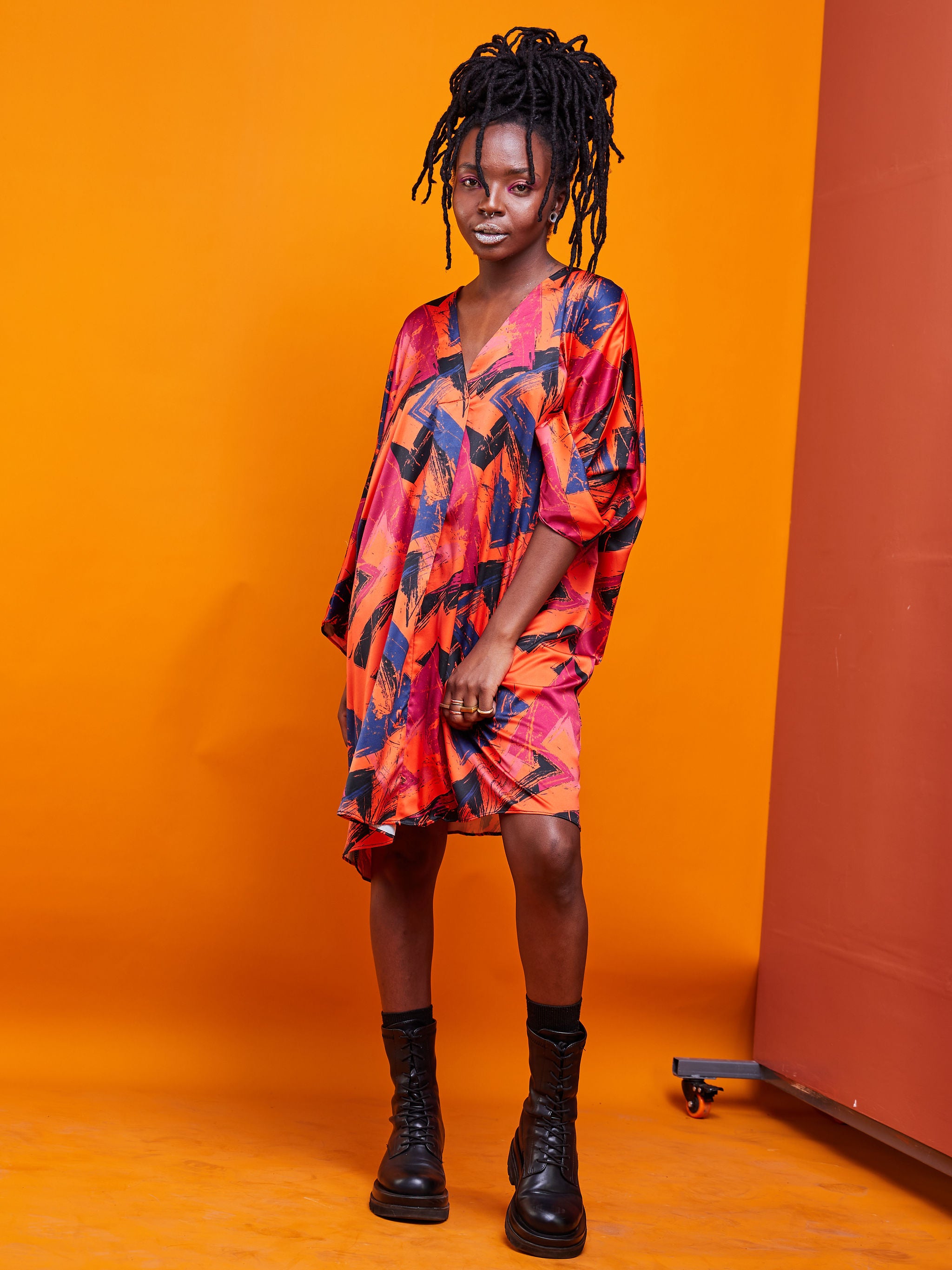 Zoya Brave Satin Loose V-neck Top - Orange Abstract Print