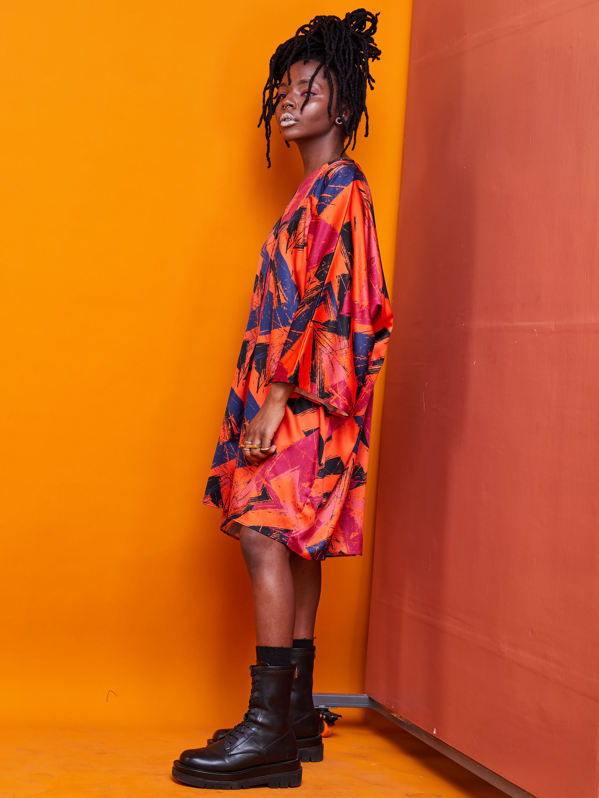 Zoya Brave Satin Loose V-neck Top - Orange Abstract Print