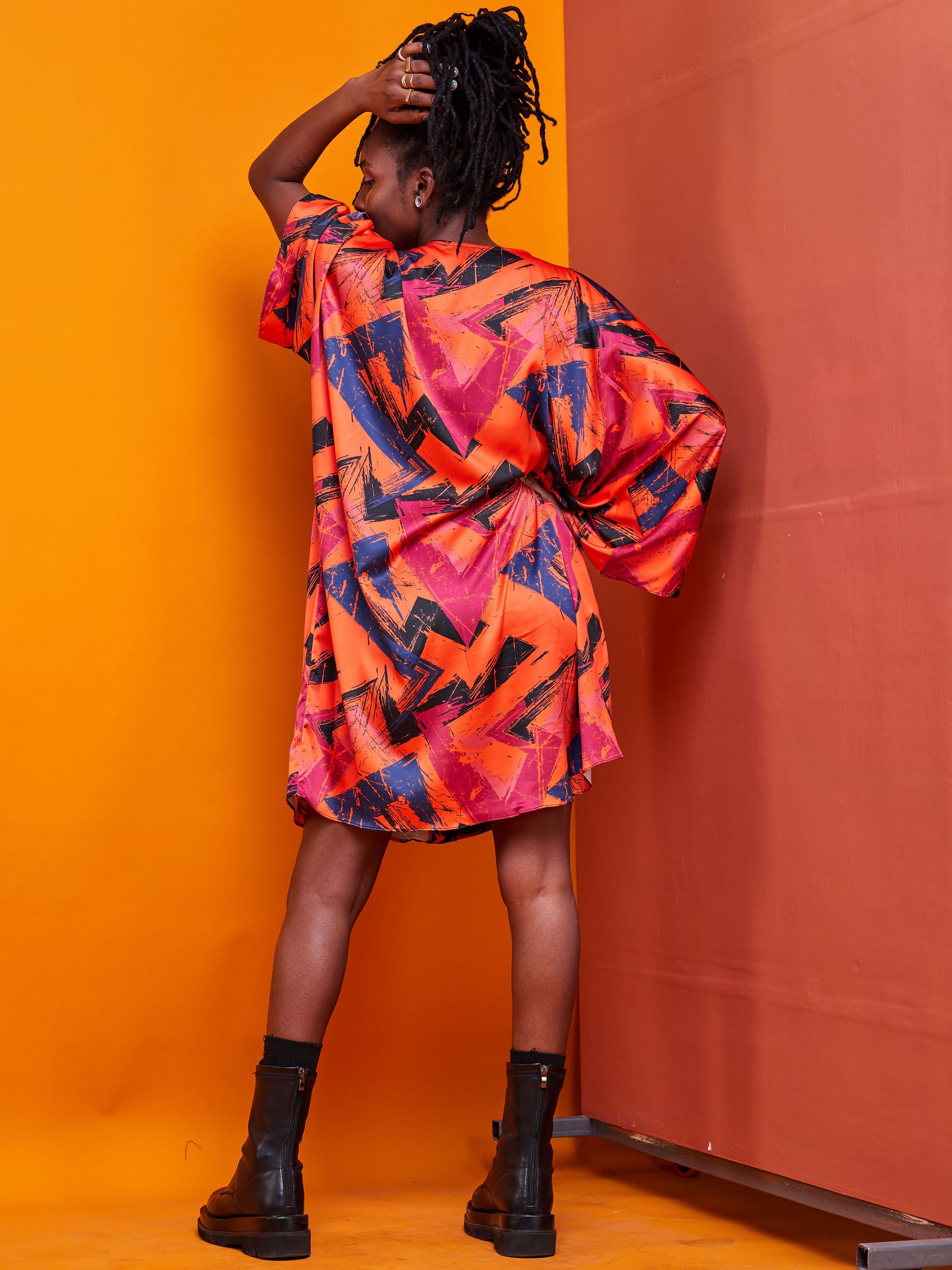Zoya Brave Satin Loose V-neck Top - Orange Abstract Print