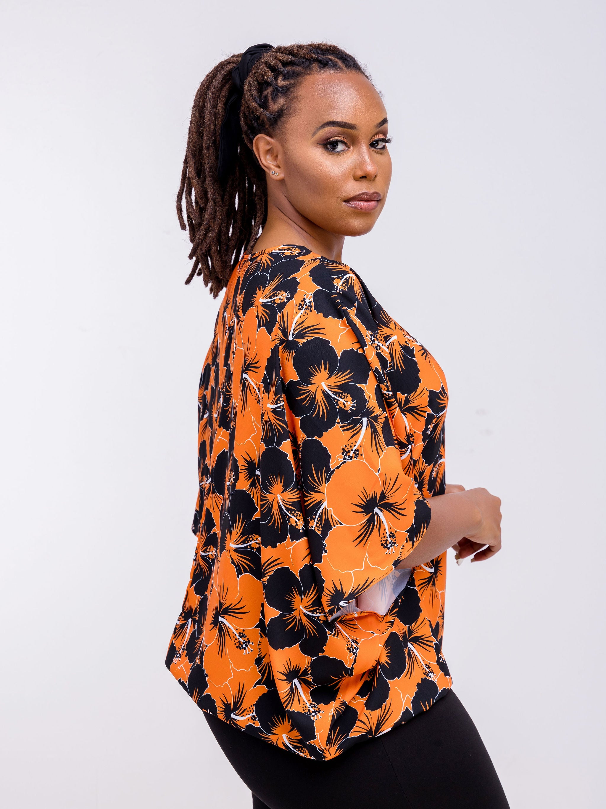 Vivo Zola Dolman Loose Top - Orange / Black Floral Print